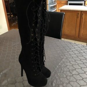 stiletto laced black high boots,never worn